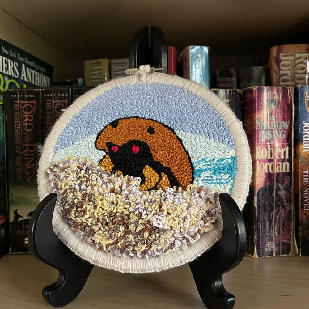 Pokemon punch needle wall hanging - Kabuto at the beach